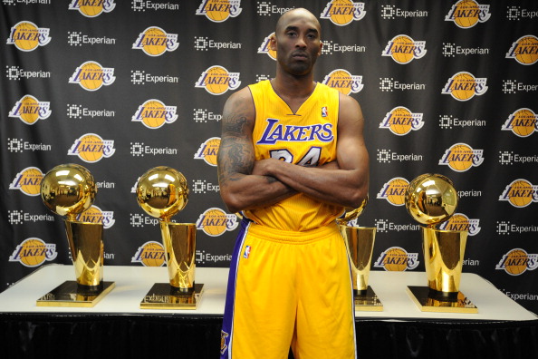 Kobe Bryant with Trophies